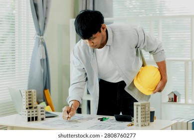 Sharp building expert analyzing company construction operation data and accurate structural safety metrics.