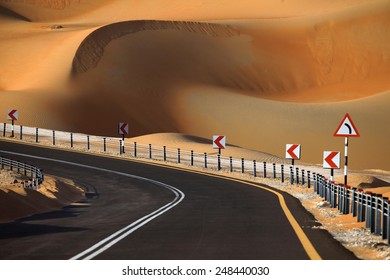 Sharp Curve On A Desert Road In Liwa, UAE