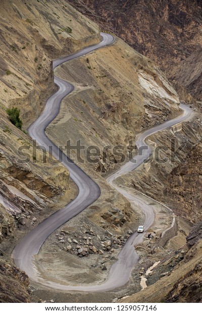 Sharp curve on mountain road in Himalaya mountains,\
Ladakh region, India