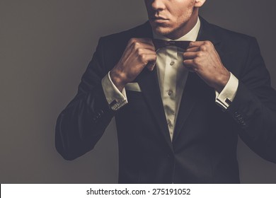 Sharp dressed man wearing jacket and bow tie - Shutterstock ID 275191052