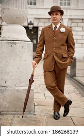 Sharp Dresser In Brown Suit And Matching Bowler Hat