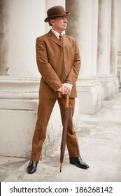 Sharp Dresser In Brown Suit And Matching Bowler Hat