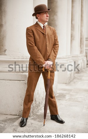 Sharp Dresser In Brown Suit And Matching Bowler Hat