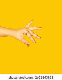  A sharp, editorial-style image of a hand styled with a bold ring and nail colorâ€”perfect for brands looking to overlay food , perfumes, rings, tech gadgets, or skincare essentials.