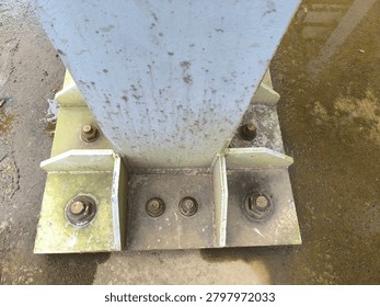 Sharp Focus Photography of Coroded Hex Bolts Heavy Washers Fastened into Structural Steel Baseplate Anchor