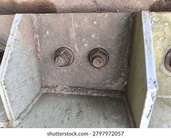 Sharp Focus Photography of Coroded Hex Bolts Heavy Washers Fastened into Structural Steel Baseplate Anchor
