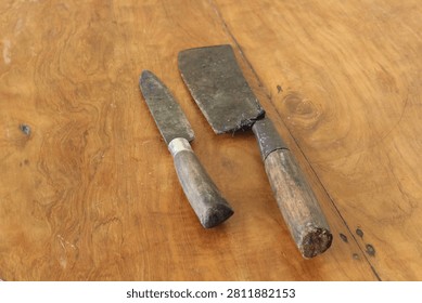 A sharp kitchen knife with a unique shape