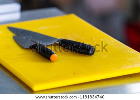 Sharp Knive with Black Handles Laying on Table - Isolated Object, Closeup View