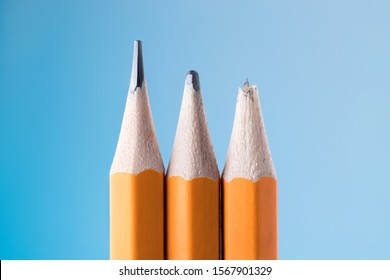 Sharp pencil, dull pencil and broken pencil. Variation, life cycle, wear and aging, concept.