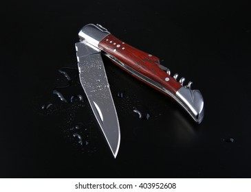 Sharp pocketknife on a black background