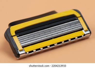 Sharp Razor Blade Cassette  Macro Close Up View On Brown Background