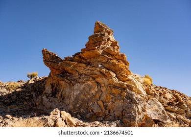 Sharp Rock Formation Against A Blue Sky On Corkscrew Peak In Death Valley National Park