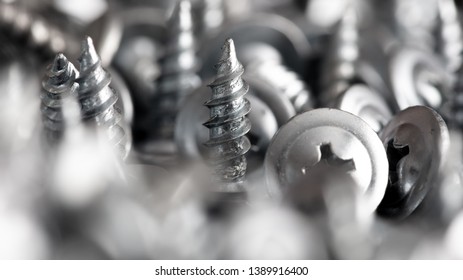 Sharp screws as abstract background.