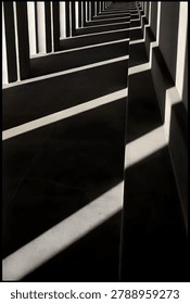 Sharp shadow lines create an abstract pattern on staircase with contrast