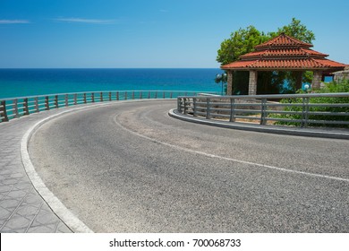 Sharp turn of the road with a scenic view of the Mediterranean sea in Tarragona, Spain