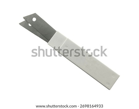 Sharp utility knife replacement blades in a protective plastic dispenser case against a white background.
