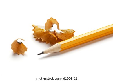 Sharp Yellow Pencil And Shavings Isolated On White Background