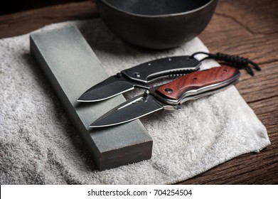 Sharpen The Pocket Knife With Grindstone Or Whetstone. Pocket Knife Care And Maintenance.