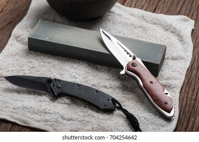 Sharpen The Pocket Knife With Grindstone Or Whetstone. Pocket Knife Care And Maintenance.