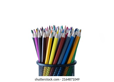 Sharpened Color Pencils Standing In A Pencil Holder Isolated On A White Background.