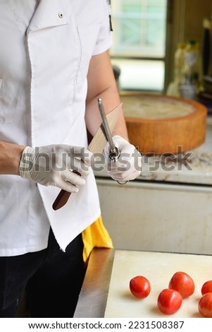 Sharpened knife quickly by the chef.