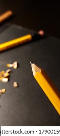Sharpening pencils to write a letter at late night