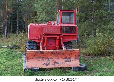 SHARYA, RUSSIA - SEPTEMBER 24, 2018: TDT-55 - tracked skidder at the edge of the forest