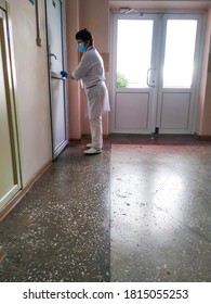 Sharypovo, Russia, September 2020, Cleaning Up The Hospital. Sanitary Treatment In The Clinic. Antiviral Treatment. Cleaning Lady Washing The Door. Out Of Focus. Editorial