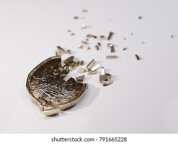 Shattered British Pound Coin On White Background