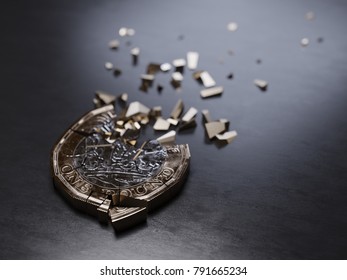 Shattered British Pound Coin On Dark Background (cold Tones)