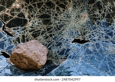 Shattered Glass Close-up. A detailed view of shattered glass - Powered by Shutterstock - Get 15% off with code: PIKWIZARD15