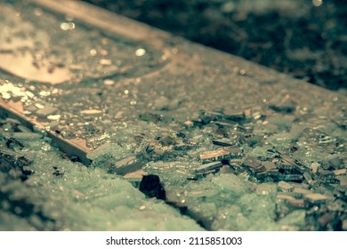 Shattered Glass On The Floor. Safety Glass, Tempered, Broken In Million Pieces On The Floor.