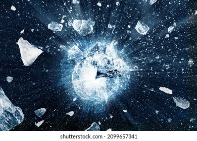 Shattered Ice Background. Crushed Ice Pieces Spread Away From The Center In Black Background.