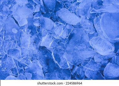 Shattered Layers Of Cool Blue Ice Sheets, Background In Blue.