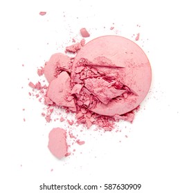 Shattered pink eyeshadow, isolated on a white background.