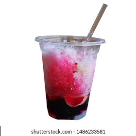 
Shave Ice Or Snow Cone In A Clear Plastic Cup On A White Background.