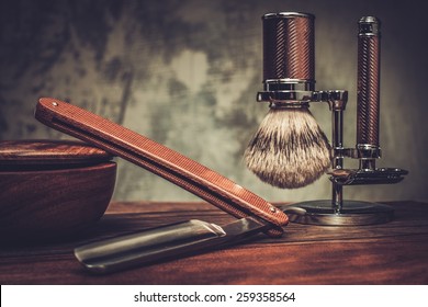 Shaving accessories on a luxury wooden background 