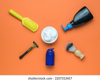 Shaving Accessories Stacked Around A Bowl Of Foam. Minimal Concept Of Men's Cosmetics. Flat Lay.