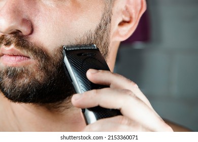 shaving the beard with a clipper