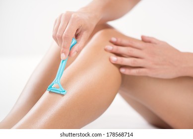 Shaving Legs With Razor.