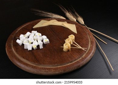 Shavuot Table, With Cheese Platter And Wheat Stalks, Jewish Holiday Of Wheat Harvest