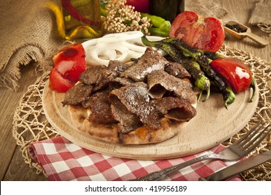 Shawarma Beef Turkish traditional doner on wooden Plate concept
