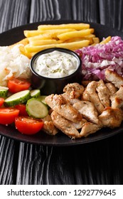 Shawarma Bowl With Chicken, Vegetables And Sauce Close-up On A Wooden Table. Vertical
