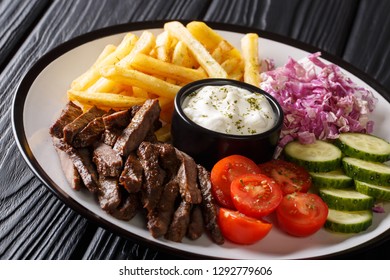 Shawarma Bowl With Lamb, Vegetables. French Fries And Sauce Close-up On A Wooden Table. Horizontal
