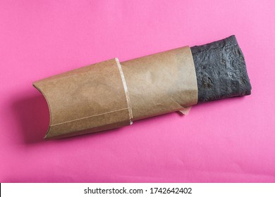 Shawarma Roll With Black Pita On Pink Background. Copy Space.