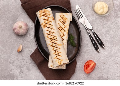 Shawerma Guros With Meat And Vegetables On Black Plate 