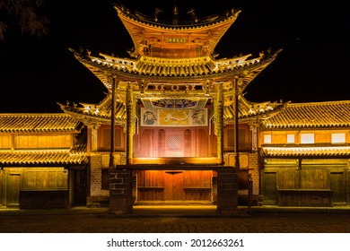 Shaxi, Yunnan, China - January, 2021: The night view of the old theatre with an open air stage built in the ancient village of Shaxi, near Dali, Yunnan, China, in the tradtional style of Bai people
