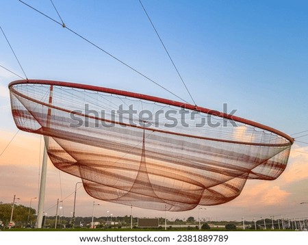 She Changes, known locally as anemona, is a sculpture designed by artist Janet Echelman for the cities of Porto and Matosinhos, Northern Portugal