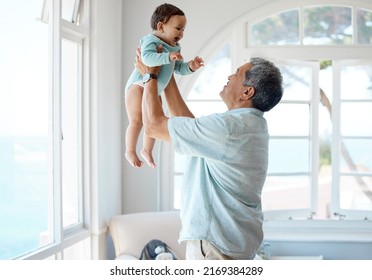 She Loves Her Grandpa. Shot Of A Senior Man Spending Time With His Grandchild At Home.