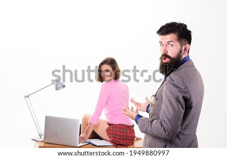 She makes him crazy. Man boss enter office of sexy girl working laptop. Office manager or secretary. Sexy personal secretary. Full of desire. Sexual fantasy. Sexy lady worker. Ready for inspection